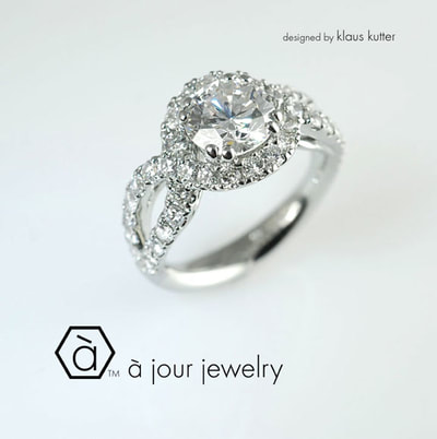 Halo diamond engagement ring 19K white gold